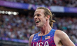  Cole Hocker of Team United States celebrates winning the gold medal after the Men's 1500m...