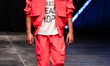 A model is running the runway during the Marcel Ostertag fashion show at Berlin Fashion We...