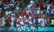 Achraf Hakimi of the Morocco team is celebrating with a teammate after scoring the sixth g...