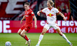 FC Twente player Daan Rots and Red Bull Salzburg player Maurits Kjaergaard are playing dur...