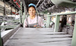 A worker is working on the production line of a workshop of a woven bag company in Lianyun...