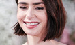 Lily Collins wearing a custom Armani Prive dress arrives at the Los Angeles Premiere Of Ne...