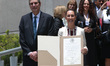 Claudia Sheinbaum Pardo is showing the certificate of qualifying majority after receiving...