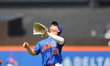 New York Mets 1B Pete Alonso #20 is making a catch during the second inning of the basebal...
