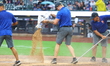 The New York Mets grounds crew is working on the field, pouring a drying agent as a consta...