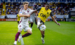 Ajax player Mika Godts and NAC player Cherrion Valerius are playing during the match NAC v...