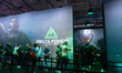 People wait in front of the Delta Force booth during the opening day of Gamescom in Cologn...