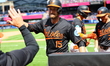 Baltimore Orioles' Austin Slater #15 is congratulated after hitting a two-run homer during...