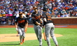 Baltimore Orioles' Austin Slater #15 is congratulated after hitting a two-run homer during...