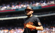 Baltimore Orioles' Colton Cowser #17 heads towards the dugout after scoring on a sacrifice...