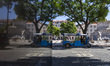 A Tuk Tuk is reflected on a glass while looking for tourists in Lisbon, Portugal, on Augus...