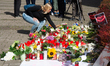 A memorial is set near the entrance of the attack site and in front of Solingen City Churc...