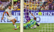Riccardo Sottil of ACF Fiorentina and Jesse Joronen of Venezia FC battle for the ball duri...