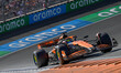 Oscar Piastri of Australia drives the (81) McLaren MCL60 Mercedes on track during the race...