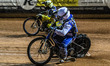 Sam McGurk of the Edinburgh Monarchs loses his steel shoe while chasing Dayle Wood of the...