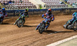 Belle Vue Colts' guest rider Joe Thompson in red leads Edinburgh Monarchs' Mason Watson in...