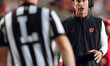 Wisconsin Badgers Head Coach Luke Fickell disputes a penalty called against the Badgers at...