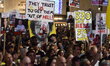 Thousands of Israelis, including the families of hostages, attend the rally in support of...