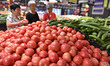 Citizens shop for vegetables at a supermarket in Fuyang, China, on September 1, 2024. 