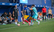 Players are in action during the Primera RFEF 2024-2025 match between FC Andorra and FC Ba...