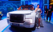 A new energy vehicle is displayed at BYD's stand at 2024 ChinaJoy in Shanghai, China, on J...