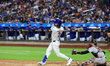 Jesse Winker of the New York Mets, #3, connects for a grand slam home run during the first...