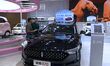 Promotional information about replacement vehicles is seen at the 23rd Autumn Internationa...