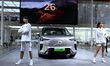 A new car is unveiled at the 23rd Autumn International Auto Show in Qingdao, China, on Sep...