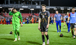 North Macedonia goalkeeper Marko Alchevski and North Macedonia player Reshat Ramadani duri...