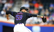 New York Mets starting pitcher Sean Manaea #59 throws during the second inning of the base...