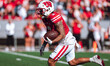 Wisconsin Badgers wide receiver Trech Kekahuna #2 returns a kickoff against the South Dako...