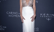 Dakota Johnson attends Kering's 3rd Annual Caring for Women Dinner at The Pool in New York...
