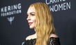 Lindsay Lohan attends Kering's 3rd Annual Caring for Women Dinner at The Pool in New York,...