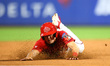 Brian Luebcke #4 advances to third base during the baseball game against the NYPD baseball...