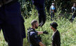 An opponent argues with a Gendarme. After months of negotiations and pressures from NGE/At...