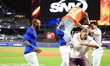 New York Mets' Starling Marte #6 is interviewed by team Communications Manager Alan Suriel...