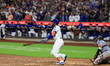 New York Mets' Starling Marte #6 connects for the game-winning single during the tenth inn...
