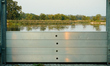 A newly installed flood barrier is seen alond the Oder river with the Polish border seen o...