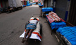 A man sleeps on the cart in Colombo, Sri Lanka, on September 22, 2024. A curfew is imposed...