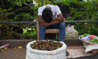 A vendor sleeps during the curfew in Colombo, Sri Lanka, on September 22, 2024. The curfew...