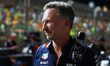 Oracle Red Bull Racing Team Principal Christian Horner stands on the grid ahead of the F1...
