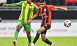 Jacinto Dala (L) of Al Wakrah SC battles for the ball with Andre Adel Bader Al-Ahmad (R) o...