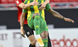 Ricardo Jorge Gomes of Al Wakrah SC battles for the ball with David Garcia of Al Rayyan SC...