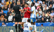 Referee Robert Jones speaks with Morgan Gibbs-White of Nottingham Forest during the Premie...