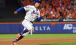 Mark Vientos #27 of the New York Mets scores during the second inning of the baseball game...
