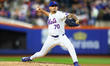 New York Mets relief pitcher Jose Butto #70 throws during the seventh inning of the baseba...