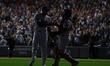 New York Mets relief pitcher Edwin Diaz #39 and catcher Francisco Alvarez #4 shake hands a...