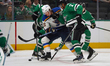 Matt Dumba #3 of the Dallas Stars collides with Kasperi Kapanen #42 of the St. Louis Blues...