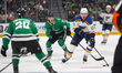 Alex Toropchenko #13 of the St. Louis Blues skates up ice while controlling the puck durin...