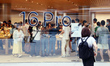Customers experience Apple's new flagship mobile phone, the iPhone 16, at the largest Appl...